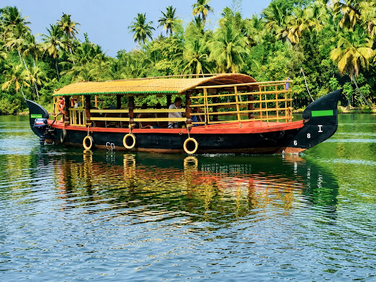 Traditional Shikara boat ride through Ashtamudi backwaters and Kallada River, Munroe Island Kerala